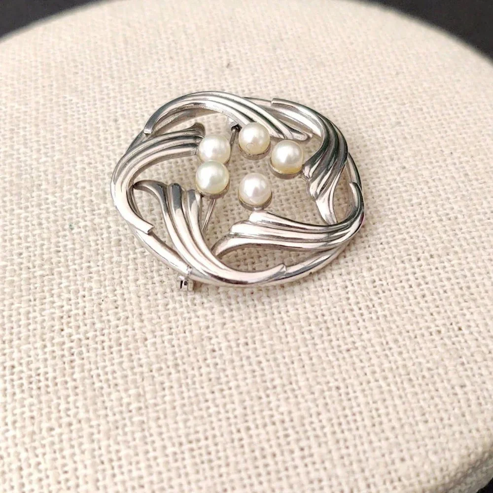 Vintage Simmons sterling and pearl brooch